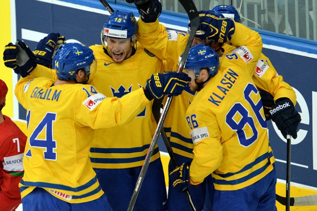 В полуфинале ЧМ-2014 шведы сыграют со сборной России, финны - против Чехии