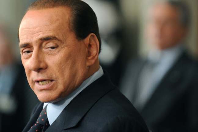 Берлускони продает 48% акций 'Милана'